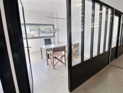 Temporary office with floor-to-ceiling windows at BURO Club Ajaccio