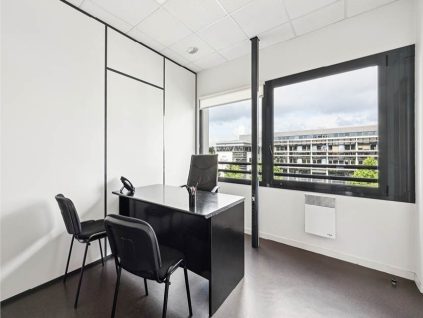 Well-lit private offices at BURO Club Caen